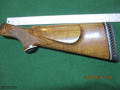 Remington 870 or 878 or M-58 finished stock, 12ga,
montecarlo, gripcap, pad, lots of figure, approx 15 3/4 lop