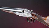 Holland and Holland Sidelock Ejector Toplever Hammerless "Modele DeLuxe" 12 bore 2 3/4" game gun - 1 of 19