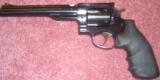 Ruger Redhawk
44 Mag Revolver with 7-1/2