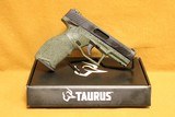 NEW Taurus TX22 Full Size .22LR Pistol (Green Splatter Black) 1-TX22141SP2 TX-22 - 1 of 3