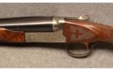 WINCHESTER MODEL 23 GRANDE CANADIAN DOUBLE BARREL SHOTGUN 2 Gun Set 12 and 20 GA
see 05749382. This is a set of two unfired as new Canadian Grandes # - 5 of 9