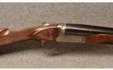 WINCHESTER MODEL 23 GRANDE CANADIAN DOUBLE BARREL SHOTGUN 2 Gun Set 12 and 20 GA
see 05749382. This is a set of two unfired as new Canadian Grandes # - 3 of 9