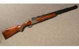 Winchester Super Grade XTR 101 12 GA / .30-06 over under with scope - 1 of 9