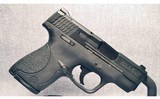 Smith & Wesson ~ M&P 9 Shield ~ 9mm Luger - 1 of 4