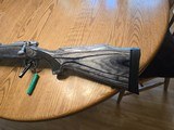 Remington 700 Left Hand 338 RUM 338 Remington Ultra Mag with Black Laminated Stock - 2 of 11