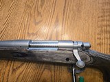 Remington 700 Left Hand 338 RUM 338 Remington Ultra Mag with Black Laminated Stock - 3 of 11