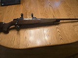 Browning A-Bolt Medallion Boss engraved 7mm Rem
w 30mm rings