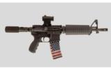 Bushmaster XM15-E2S 5.56x45MM - 1 of 2