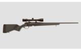 Steyr Mannlicher Safebolt Bolt Action Rifle in .25-06 with Nikon Monarch Scope - 1 of 7