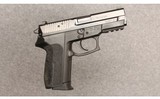 Sig Sauer~SP2022~9mm Luger - 1 of 4
