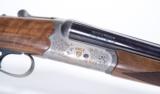 Smith & Wesson Elite Gold 20 GA S/S Ducks Unlimited English Stock Shotgun - 1 of 10