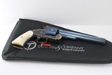 Uberti Schofield by Taylor, 45 Long Colt, 7 inch bbl, Charcoal Blue/case hardened Finish, Factory Im. Pearl Grips, factory box and case. - 5 of 5