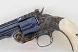 Uberti Schofield by Taylor, 45 Long Colt, 7 inch bbl, Charcoal Blue/case hardened Finish, Factory Im. Pearl Grips, factory box and case. - 2 of 7