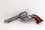 Taylor's & Co - Uberti Cattleman, 45 Colt, 5.5 inch bbl, white floral laser engraved. Gun is new in factory box. You will receive the gun pictured - 1 of 7