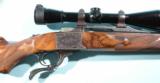 FABULOUS CUSTOM ENGRAVED GOLD INLAID RUGER NO. 1 SINGLE SHOT 6MM
REM. CAL RIFLE WITH LEUPOLD 12X SCOPE. - 3 of 7