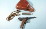 EXCELLENT JAPANESE NAMBU TYPE 14 PISTOL WITH HOLSTER, LANYARD AND EXTRA MAGAZINE.
- 1 of 9
