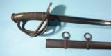 FRENCH DRAGOON TROOPER’S SWORD AND SCABBARD DATED APRIL 1880.
- 2 of 5