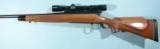 REMINGTON MODEL 700 BDL .300 WIN MAGNUM BOLT ACTION RIFLE WITH SCOPE, CIRCA 1992.
- 2 of 7