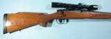 REMINGTON MODEL 700 BDL .300 WIN MAGNUM BOLT ACTION RIFLE WITH SCOPE, CIRCA 1992.
- 4 of 7