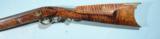 FINE TENNESSEE BRASS MOUNTED TIGER MAPLE PERCUSSION MULE EAR LONGRIFLE CIRCA 1840’S.
- 11 of 14