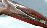 FINE L.C. SMITH / HUNTER ARMS CO. FIELD GRADE 12 GA. 30” SHOTGUN WITH SCARCE FACTORY CURTIS FOREND RELEASE CA. 1918.
- 10 of 11