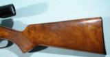 EARLY 1ST YEAR BROWNING T BOLT OR T-BOLT .22LR BOLT ACTION RIFLE WITH SCOPE, CIRCA 1965.
- 3 of 7