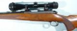 PRE-'64 WINCHESTER MODEL 70 FW FEATHERWEIGHT .308WIN BOLT ACTION RIFLE WITH SCOPE, CIRCA 1953.
- 2 of 9