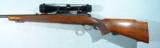 PRE-'64 WINCHESTER MODEL 70 FW FEATHERWEIGHT .308WIN BOLT ACTION RIFLE WITH SCOPE, CIRCA 1953.
- 5 of 9