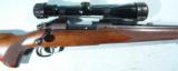 PRE-'64 WINCHESTER MODEL 70 FW FEATHERWEIGHT .308WIN BOLT ACTION RIFLE WITH SCOPE, CIRCA 1953.
- 4 of 9