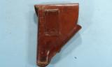 WWII OR WW2 WALTHER PPK HOLSTER OR OTHER MEDIUM AUTOMATIC WITH MAG POUCH.
- 2 of 3
