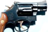 SMITH & WESSON MODEL 15-4 OR 15 COMBAT MASTERPIECE WITH SCARCE 2” BARREL CIRCA 1977.
- 5 of 7