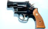 SMITH & WESSON MODEL 15-4 OR 15 COMBAT MASTERPIECE WITH SCARCE 2” BARREL CIRCA 1977.
- 2 of 7