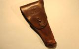 WWI U.S. MODEL 1916 FLAP HOLSTER FOR 1911 PISTOL WITH ARMY INFANTRY COLLAR DISC ON FLAP.
- 2 of 4