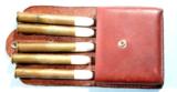 FIVE SHARPS .50-3 ¼” CAL. CARTRIDGES IN CUSTOM LEATHER CASE. - 1 of 4