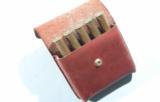 FIVE SHARPS .50-3 ¼” CAL. CARTRIDGES IN CUSTOM LEATHER CASE. - 2 of 4