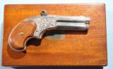 MINT CASED FACTORY ENGRAVED REMINGTON-RIDER .32 EXTRA SHORT CAL. MAGAZINE DERINGER CA. 1870’S.
- 4 of 10