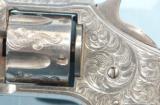 CASED RARE MINT FACTORY ENGRAVED REMINGTON SMOOT’S PATENT 1ST MODEL .30 RF CAL. REVOLVER CA. 1875.
- 3 of 11