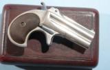 MINT CASED REMINGTON TYPE II O/U .41 RF CAL. DOUBLE DERRINGER WITH BRITISH PROOFS CA. 1888.
- 3 of 11