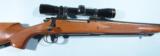 LIKE NEW REMINGTON MODEL 700 .375H&H BOLT ACTION BIG GAME RIFLE RIFLE WITH LEUPOLD VARI-X II 2x7 SCOPE. - 2 of 7