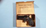 EXCELLENT REMINGTON ARMS CO. TYPE II BLUED .41RF CAL. O/U DOUBLE DERRINGER IN ORIGINAL BOX CA. 1890’S.
- 1 of 8
