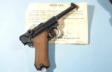 NEAR MINT WW2 LUGER P-08 BYF CODE 42 SEMI-AUTO 9MM PISTOL W/HOLSTER AND BRING BACK CERTIFICATE DATED OCT. 1945. - 2 of 8