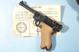 NEAR MINT WW2 LUGER P-08 BYF CODE 42 SEMI-AUTO 9MM PISTOL W/HOLSTER AND BRING BACK CERTIFICATE DATED OCT. 1945. - 1 of 8