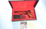 BELGIAN BROWNING MEDALIST 22LR CAL. TARGET PISTOL MINT IN ORIGINAL CASE WITH BARREL WEIGHTS AND MANUAL. CIRCA 1970’S. - 1 of 4
