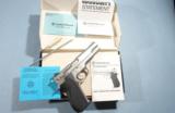 NEW IN BOX SMITH & WESSON MODEL 1006 10MM STAINLESS STEEL D.A. PISTOL. Circa 1980's. - 1 of 6