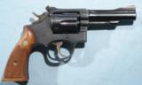 SMITH & WESSON K-22 COMBAT MASTERPIECE 4” BLUE REVOLVER CA. 1950’S.- 1 of 5