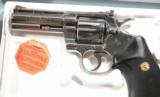 COLT PYTHON .357 MAG. CAL. 4” BRIGHT STAINLESS REVOLVER UNFIRED NEW IN BOX CA. 1980’S.
- 2 of 5