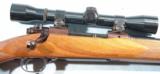 PRE-64 WINCHESTER MODEL 70 FEATHERWEIGHT .243WIN BOLT ACTION RIFLE WITH SCOPE, CIRCA 1960. - 2 of 7