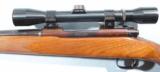 PRE-64 WINCHESTER MODEL 70 FEATHERWEIGHT .243WIN BOLT ACTION RIFLE WITH SCOPE, CIRCA 1960. - 5 of 7