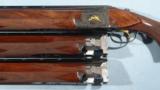 CASED LIKE NEW BELGIAN BROWNING SUPERPOSED THREE BARREL SET MIDAS GRADE 20GA. WITH TWO EXTRA SETS OF 12GA, BARRELS, CIRCA 1972 - 2 of 10