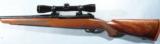 LIKE NEW WINCHESTER MODEL 70 SG SUPER GRADE .300 WIN MAG CRF(CONTROLLED ROUND FEEDING) BOLT ACTION RIFLE WITH LEUPOLD SCOPE. - 4 of 7